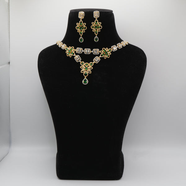 Emerald Green Jewelry set with necklace and earrings on a black mannequin bust against a white background