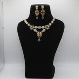 Royal blue Jewelry set with necklace and earrings on a black mannequin bust against a white background