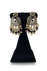 Close up of Black Polki Chandbali Earrings with onyx and pearl drops