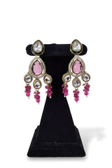 Pink ruby kundan chandelier earrings close up with fuchsia crystal bead drops and CZ halo gold plated Jewellery by Aman