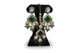 Emerald green kundan choker set with diamond geometric drop tier polki stones and matching earrings tikka full set