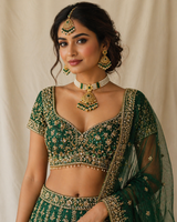 Mahira Emerald Pearl-Strand Set — gold plated pearl strand choker with triangular temple pendant with emerald stones, matching chandbali earrings and triangular maang tikka