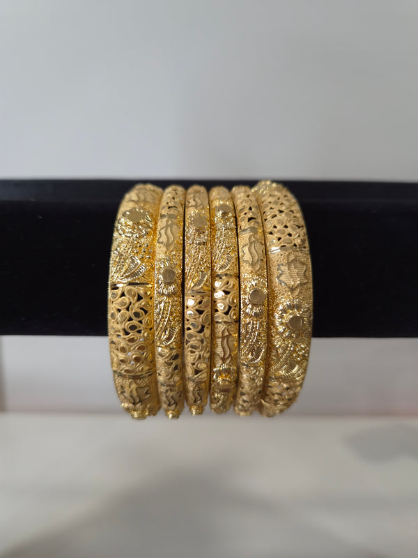 Mehraab Sunflower Filigree Kada Set — set of 6 thick gold kada bangles with sculptural sunflower motifs and deep filigree cut-work