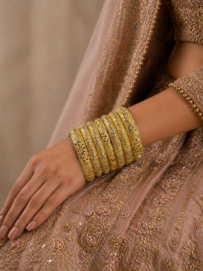 Mehraab Sunflower Filigree Kada Set — set of 6 thick gold kada bangles with sculptural sunflower motifs and deep filigree cut-work
