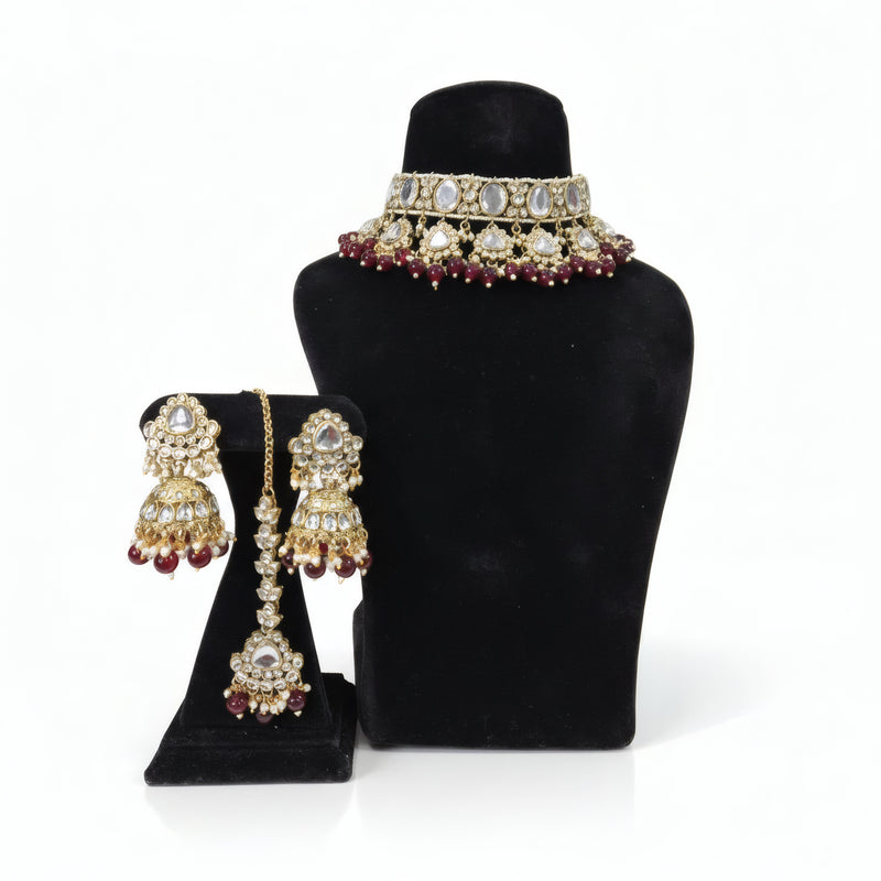 Large Kundan Choker Set — Surkh Ruby Jhumka - Jewellery set on display stand