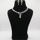 Jewelry set including a necklace and earrings on a black mannequin bust against a white background.