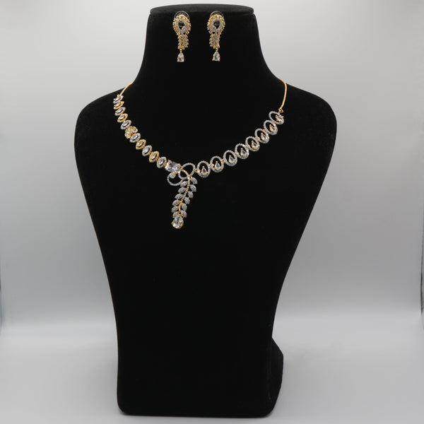Jewelry set with necklace and earrings on a black mannequin bust against a white background