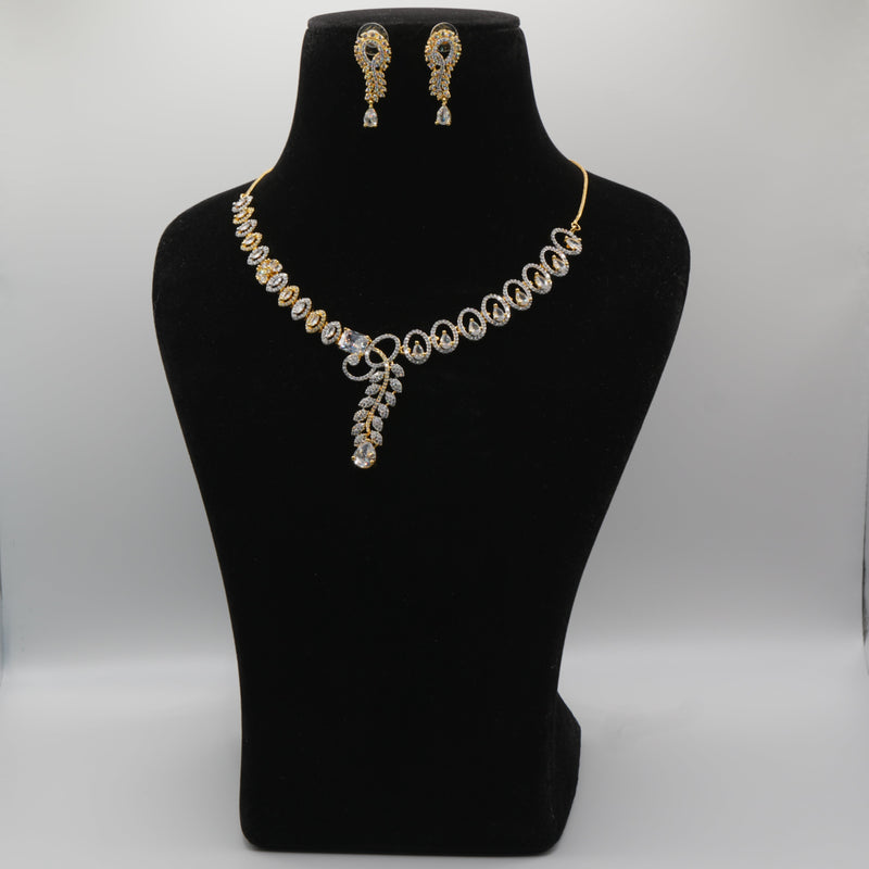 Jewelry set with necklace and earrings on a black mannequin bust against a white background