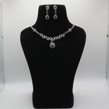Blue Jewelry set including necklace and earrings on a black mannequin bust against a white background