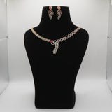 Ruby Red Jewelry set including a necklace and earrings on a black mannequin bust against a white background.