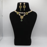 Emerald Green Jewelry set with necklace and earrings on a black mannequin bust against a white background