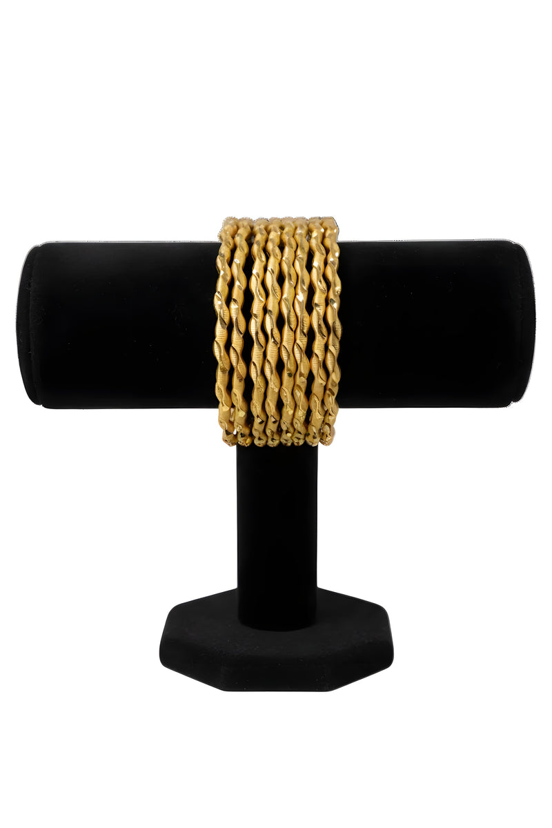 Close up of Gold Plated Twisted Rope Bangles texture detail