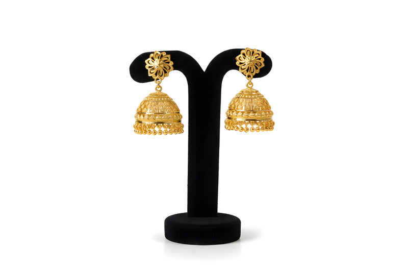Close up side view of Gold Filigree Jhumka with gold ball drops