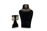 Black Polki Chandbali Necklace Earrings and Tikka Set on display
