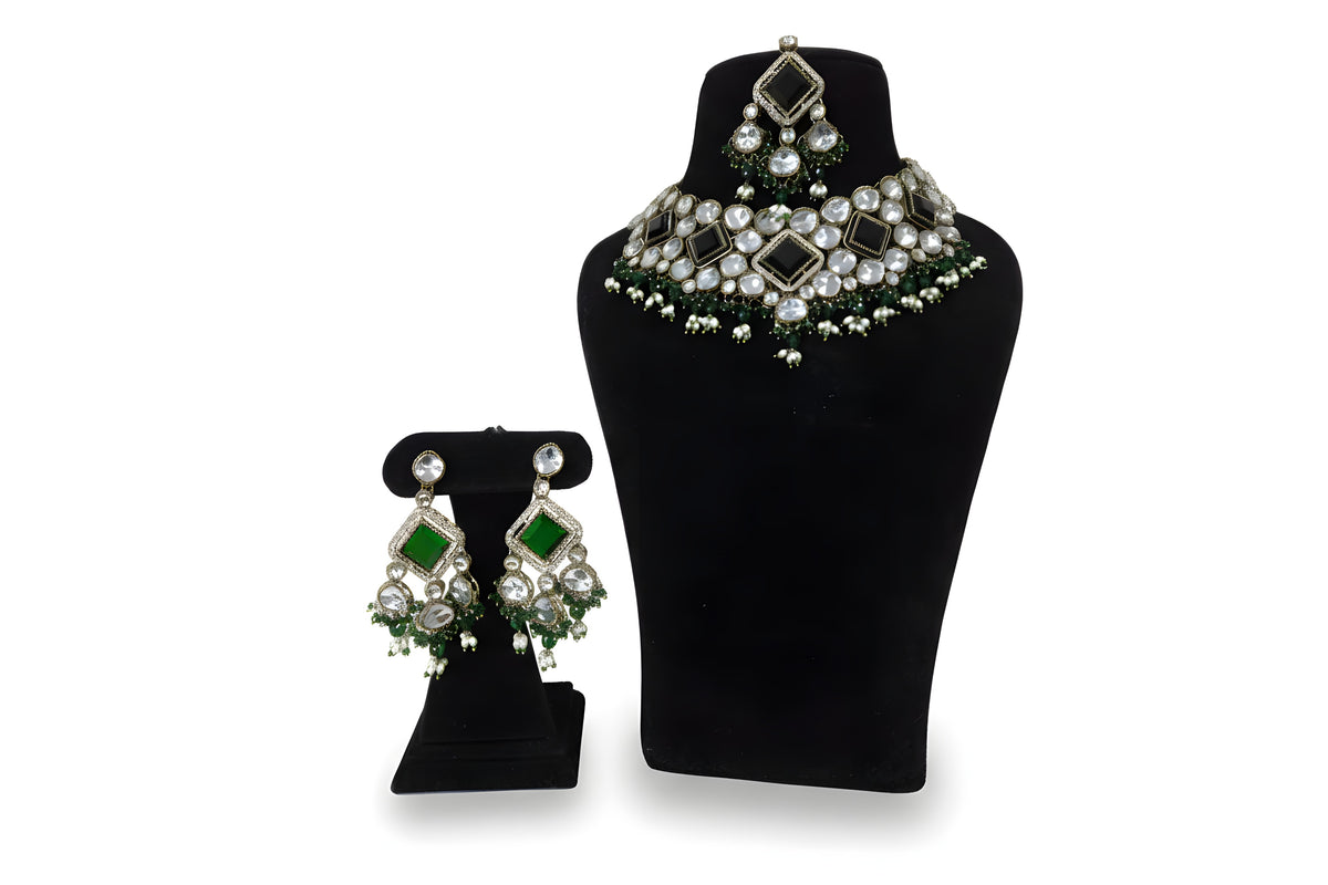 Emerald green kundan polki earrings close up with square mirror centre CZ halo and green bead pearl fringe