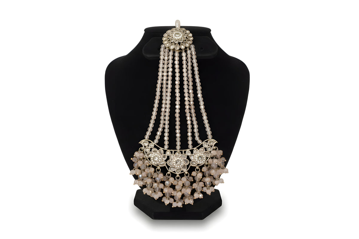 Blush pink polki passa jhoomar close up showing domed floral crown with long cascading crystal bead strands