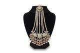 Blush pink polki passa jhoomar close up showing domed floral crown with long cascading crystal bead strands