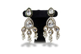 White pearl kundan chandelier earrings close up with large polki teardrop stone CZ halo and pearl cluster drops Jewellery by Aman