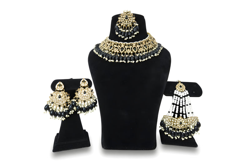 Black gold polki wedding choker necklace set with chandbali earrings and jhoomar tikka full set display Jewellery by Aman