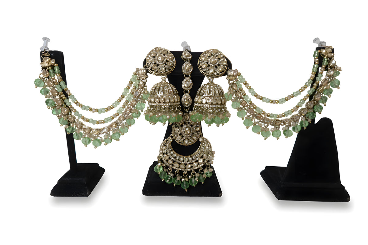 Antique gold polki kundan bahubali jhumka earrings with mint green crystal cascading hair chains and matching tikka full set