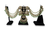 Antique gold polki kundan bahubali jhumka earrings with mint green crystal cascading hair chains and matching tikka full set