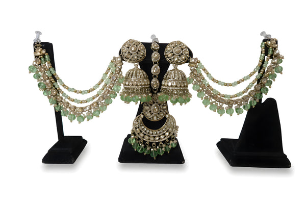 Antique gold polki kundan bahubali jhumka earrings with mint green crystal cascading hair chains and matching tikka full set
