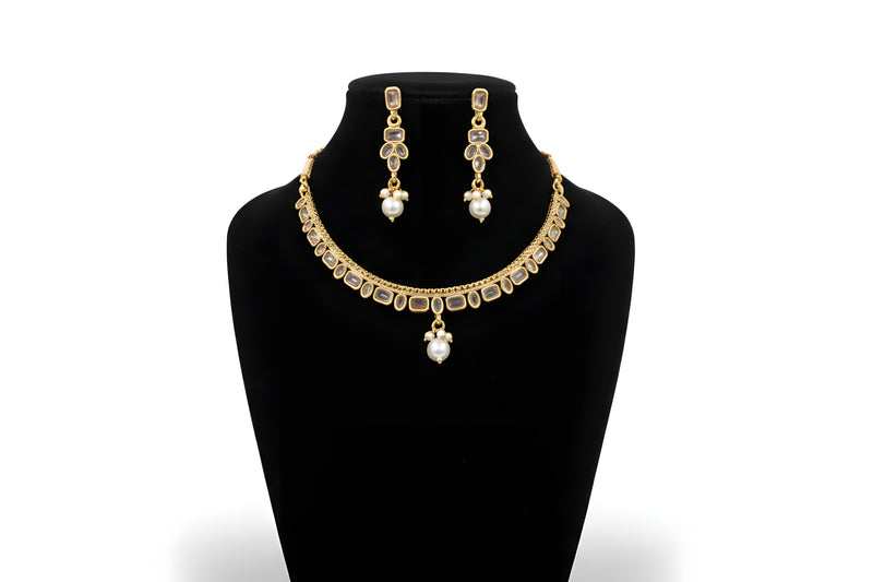 Gold plated classic polki kundan necklace with pearl drop pendant and matching drop earrings full set