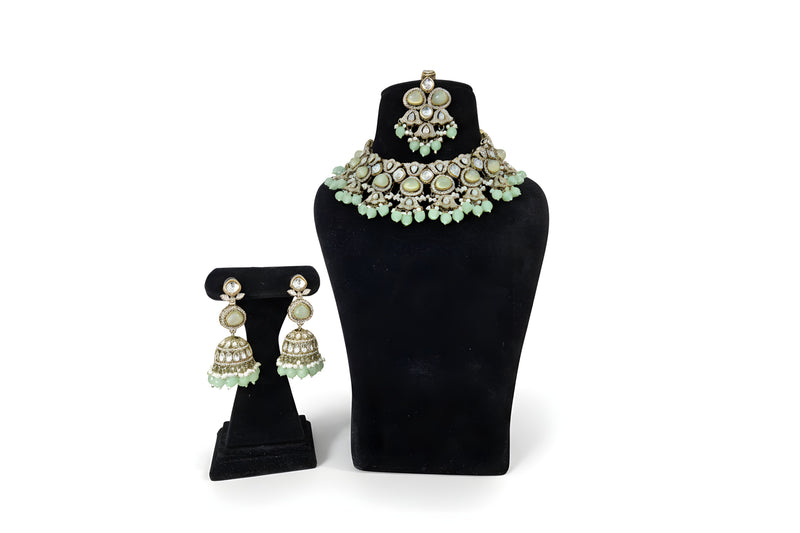 Mint green kundan choker set with jhumka earrings and tikka full set antique gold cabochon stones