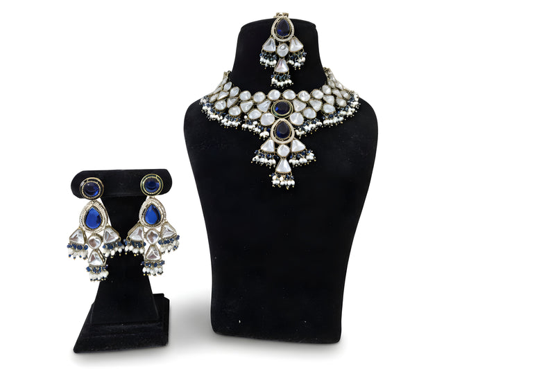 Royal blue polki kundan choker set with V pendant drop earrings and tikka full set antique gold