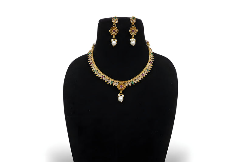 Gold plated multi colour leaf fringe choker necklace set with ruby emerald clear stones flower pendant pearl drop and earrings