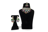 Multicolour polki kundan wedding choker necklace set with chandbali earrings and maang tikka on black display stand