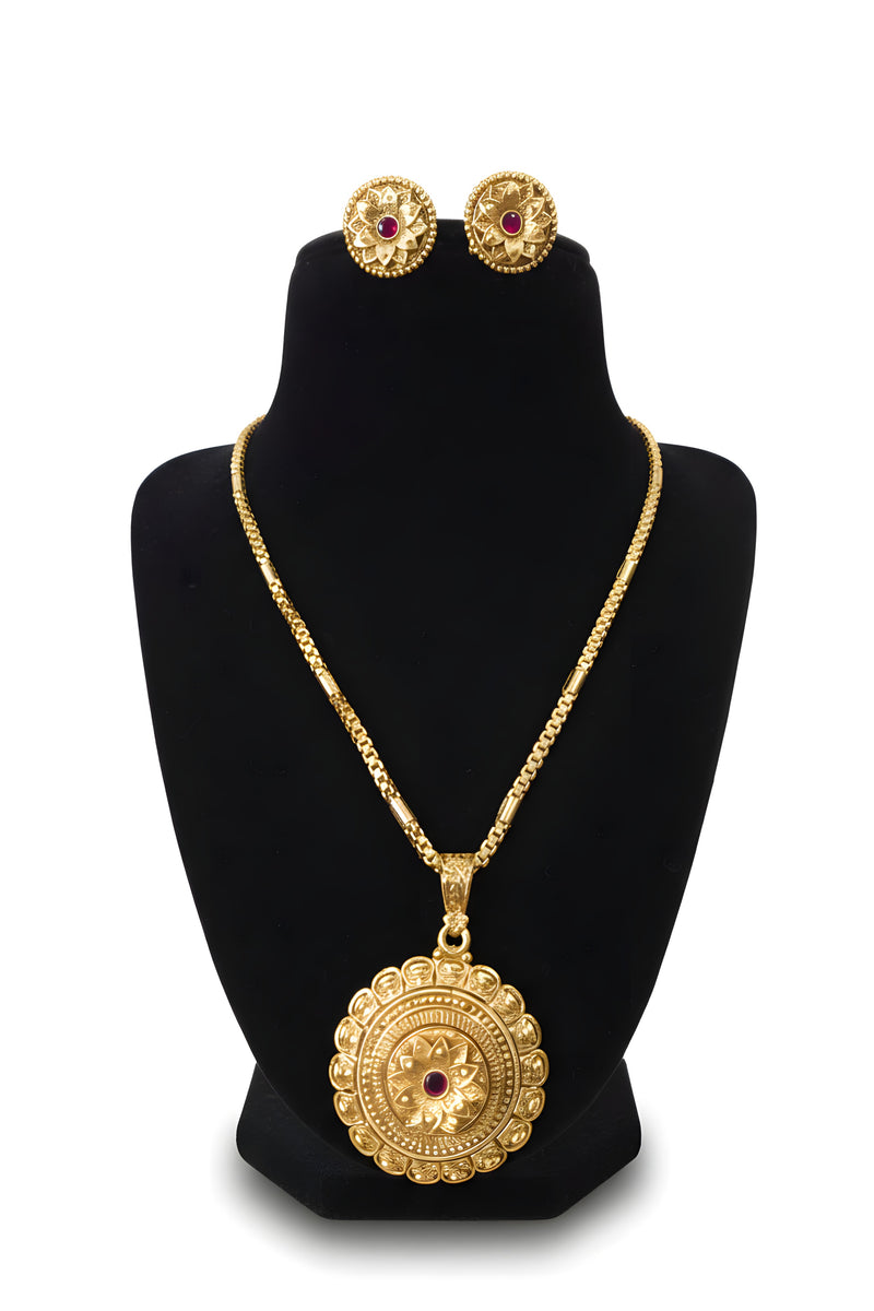 Gold plated lotus medallion pendant necklace with box chain and matching round lotus stud earrings on black display