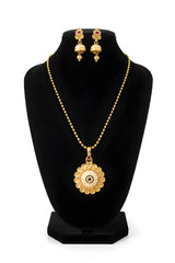 Gold plated meenakari medallion pendant necklace with ball chain and matching jhumka earrings on black display