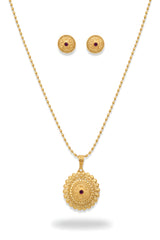 Gold plated floral filigree circular medallion pendant necklace and matching ruby centre stud earrings on black velvet bust