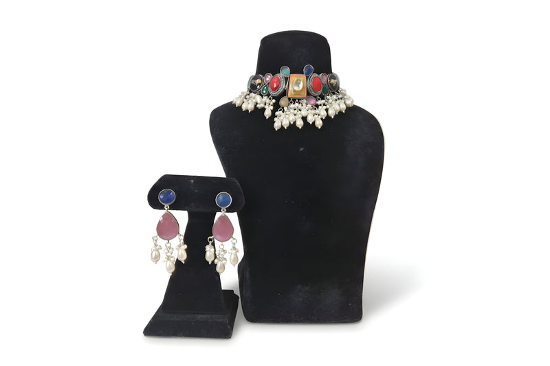 Navrang Rainbow Kundan Pearl Choker Set - Jewellery set on display stand