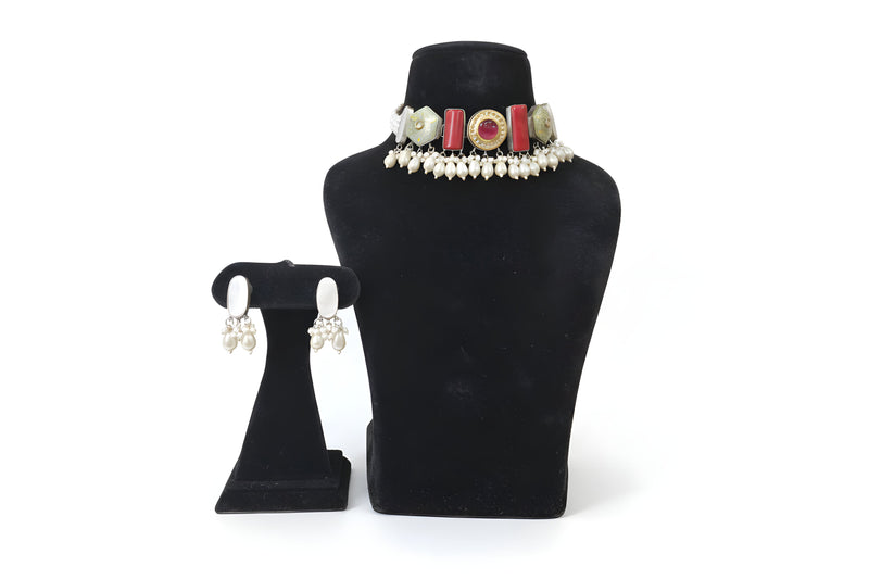Mehak Coral Meenakari Pearl Choker Set - Jewellery set on display stand