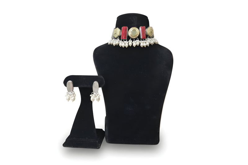Surahi Red Coral Meenakari Pearl Choker Set - Jewellery set on display stand
