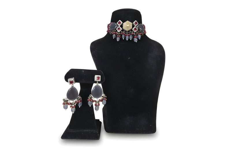 Dhuaan Smoky Grey Ruby Kundan Choker Set - Jewellery set on display stand