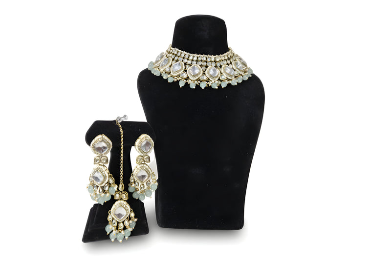 Chandni Mint Kundan Choker Set - Jewellery set on display stand