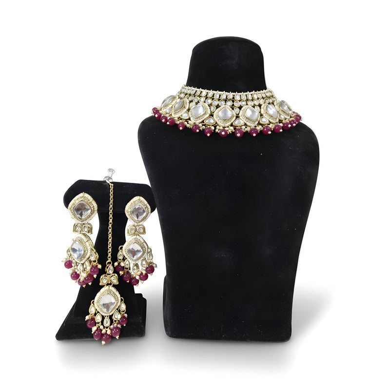 Chandni Ruby Kundan Choker Set - Jewellery set on display stand