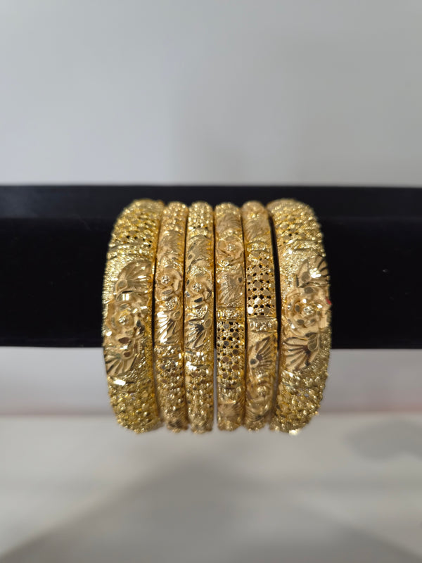 Gulbadan Rose Carved Kada Set — set of 6 thick gold kada bangles with dimensional carved rose motifs and granulation detailing