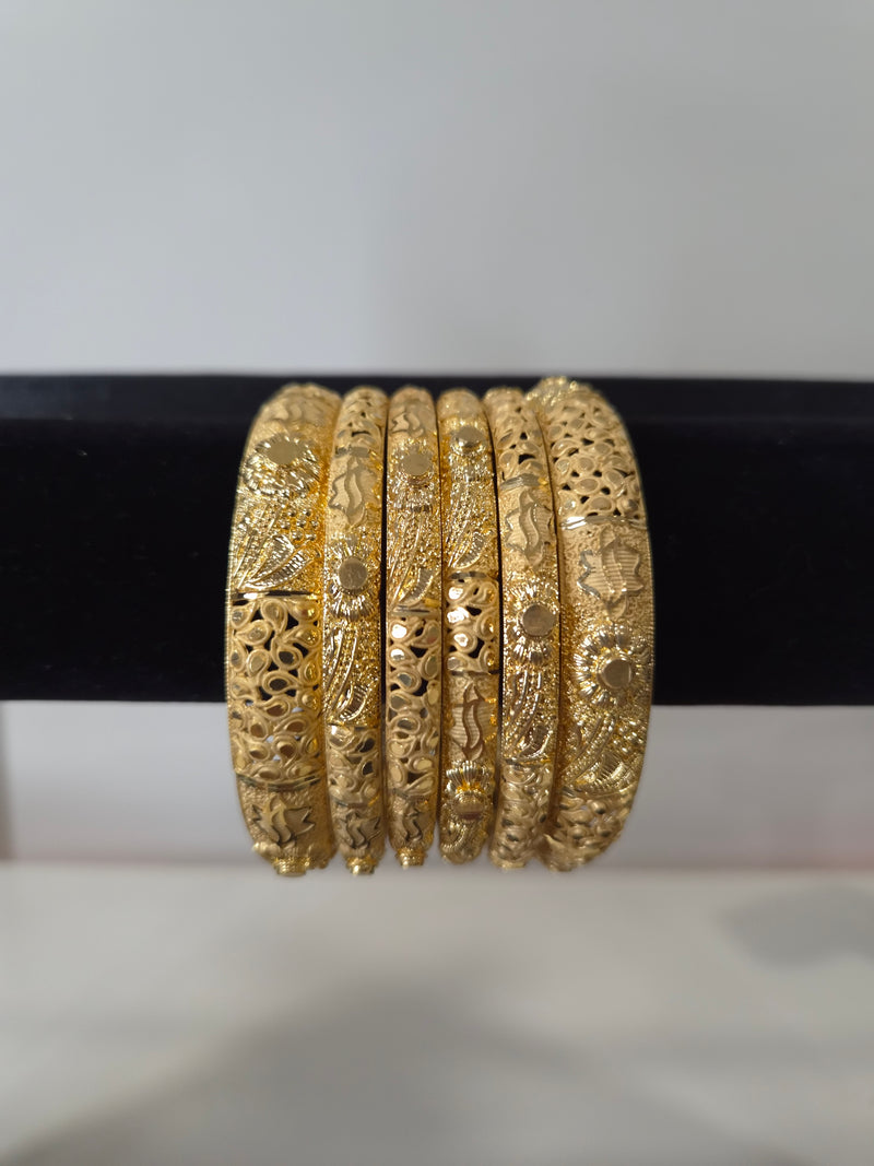 Mehraab Sunflower Filigree Kada Set — set of 6 thick gold kada bangles with sculptural sunflower motifs and deep filigree cut-work
