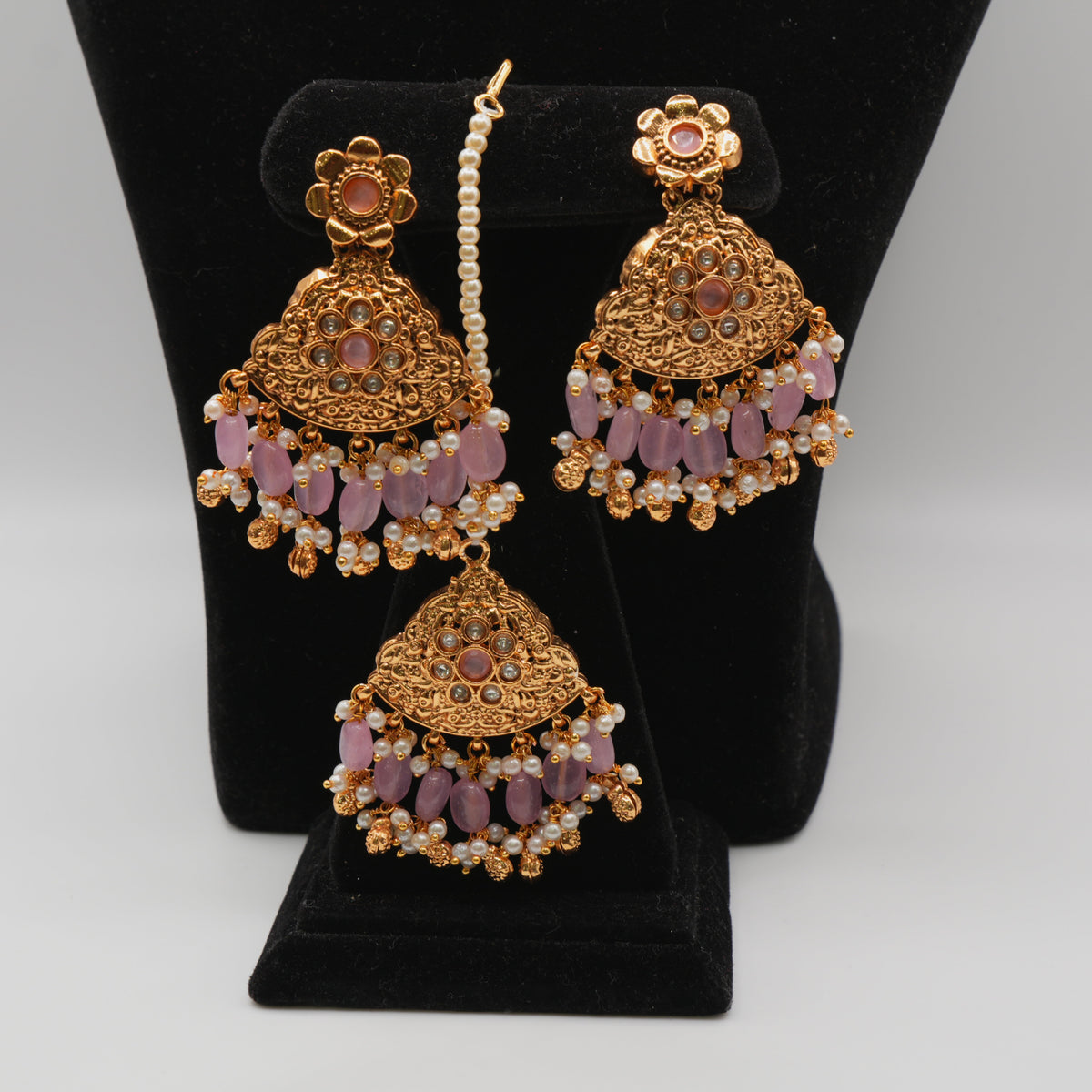 Yasmin Lavender Pearl-Strand Set — gold plated pearl strand choker with triangular temple pendant with lavender stone accents, matching chandbali earrings and triangular maang tikka